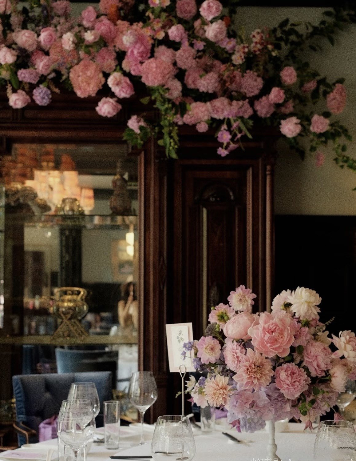private dining table with pink floral arrangement