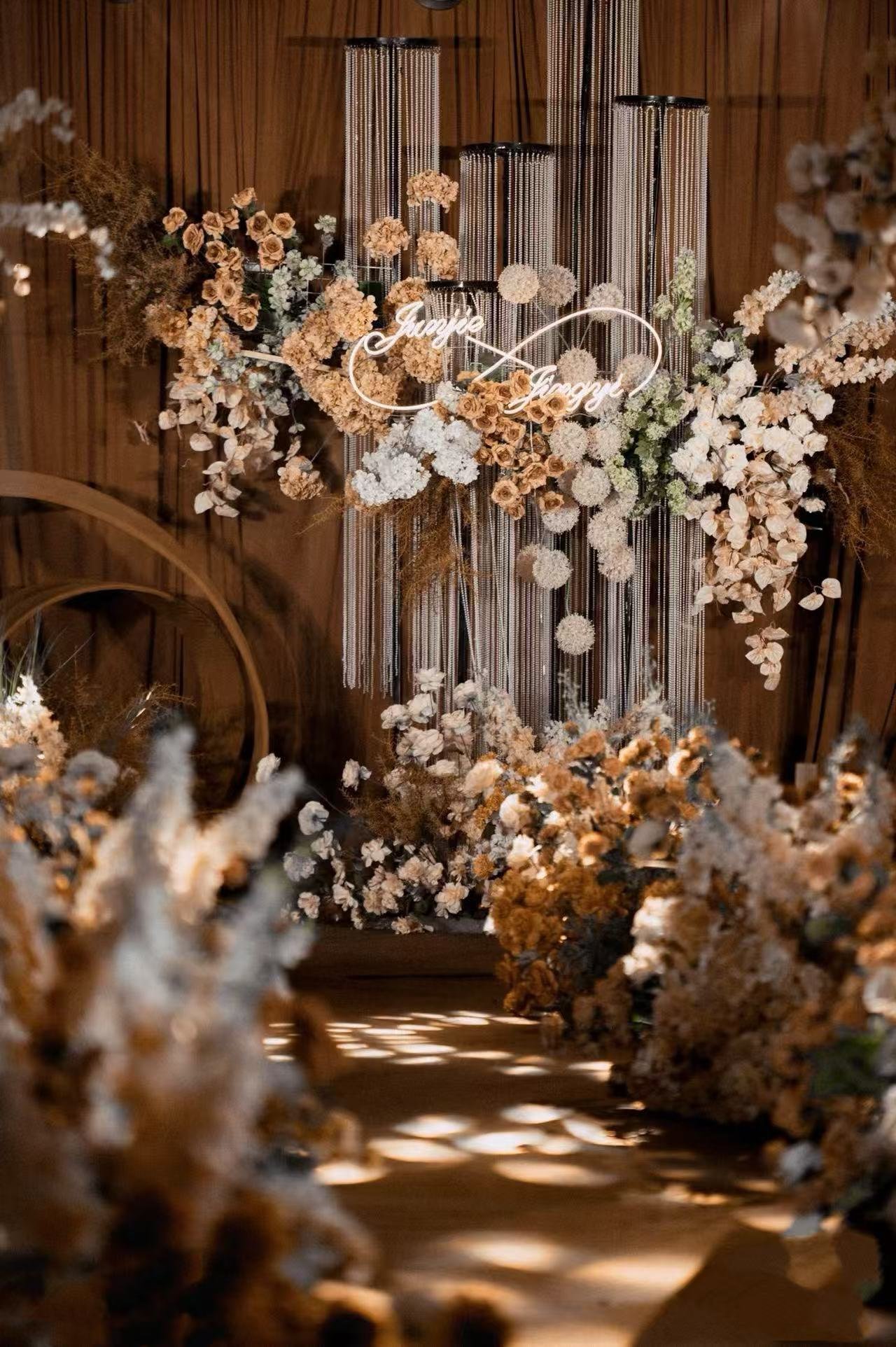 close-up luxury wedding floral backdrop installation